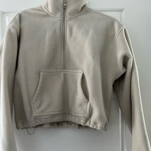 TNA sweater. Super soft and comfy. Size Small. Tan colour $25